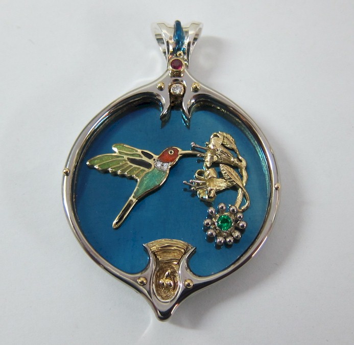 Nest Wall Sculpture has hidden this blue Titanium  Hummingbird Pendant