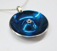 Titanium Pendant Coned Circled Design