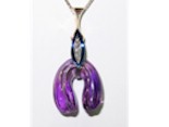 Carved Amethyst Pendant with diamonds set in titanium